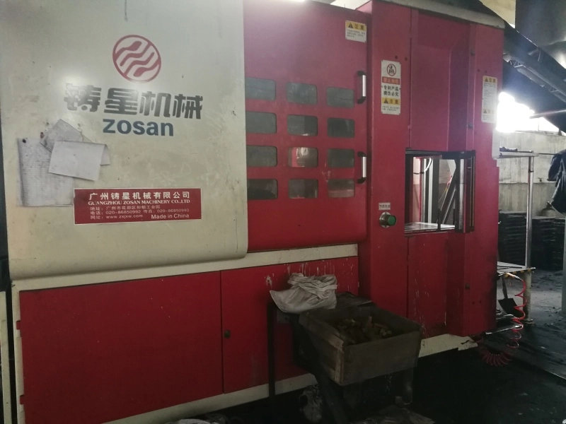 Sand casting molds and finished metal parts