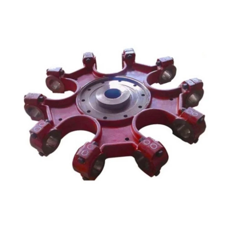 Red eight-armed star-shaped machinery hub with roller clamps at the ends.