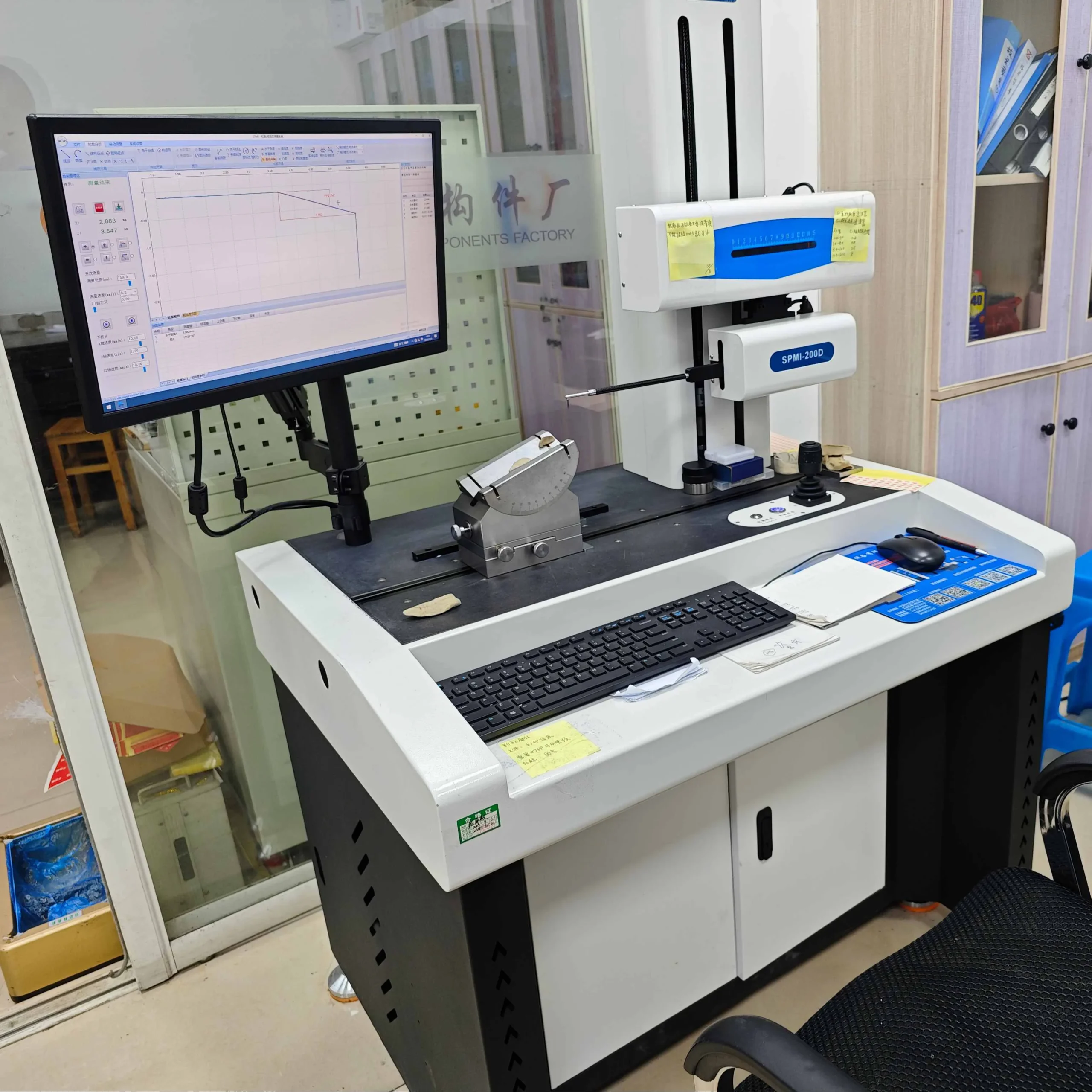 Contour and surface roughness measuring machine