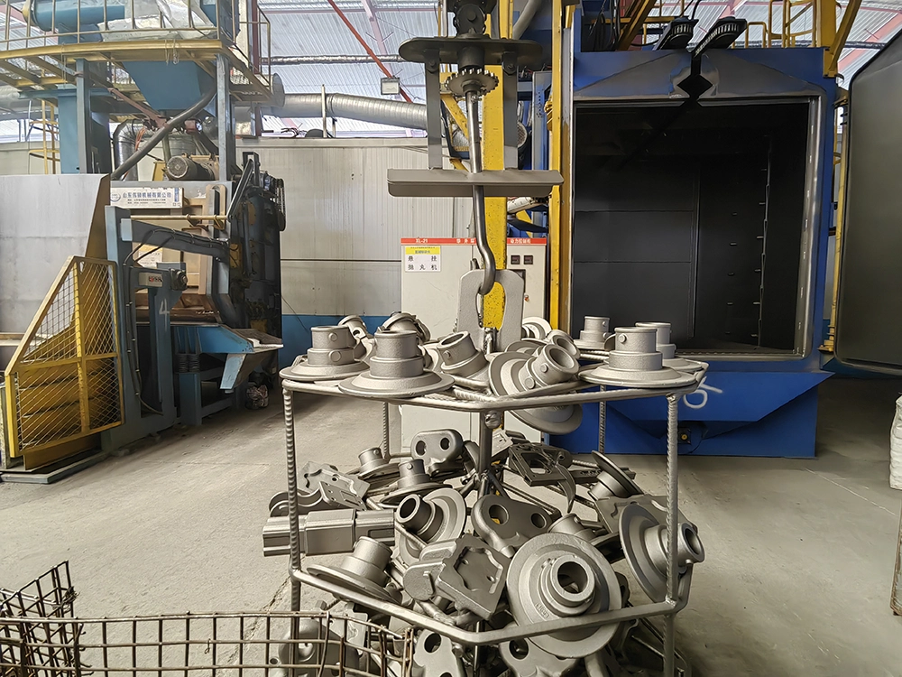 Shot blasting machine cleaning cast iron bearing covers